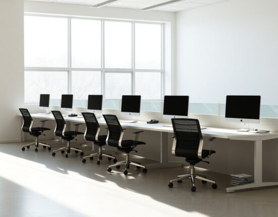 Empty office desks symbolize the Algorand Foundation's 25% workforce reduction.