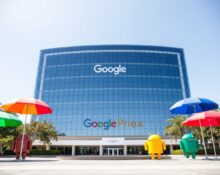 Google headquarters campus on a sunny day with colorful umbrellas in foreground