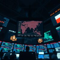 Asian currency market trading screens with mixed PMI data and Iran map showing uncertainty