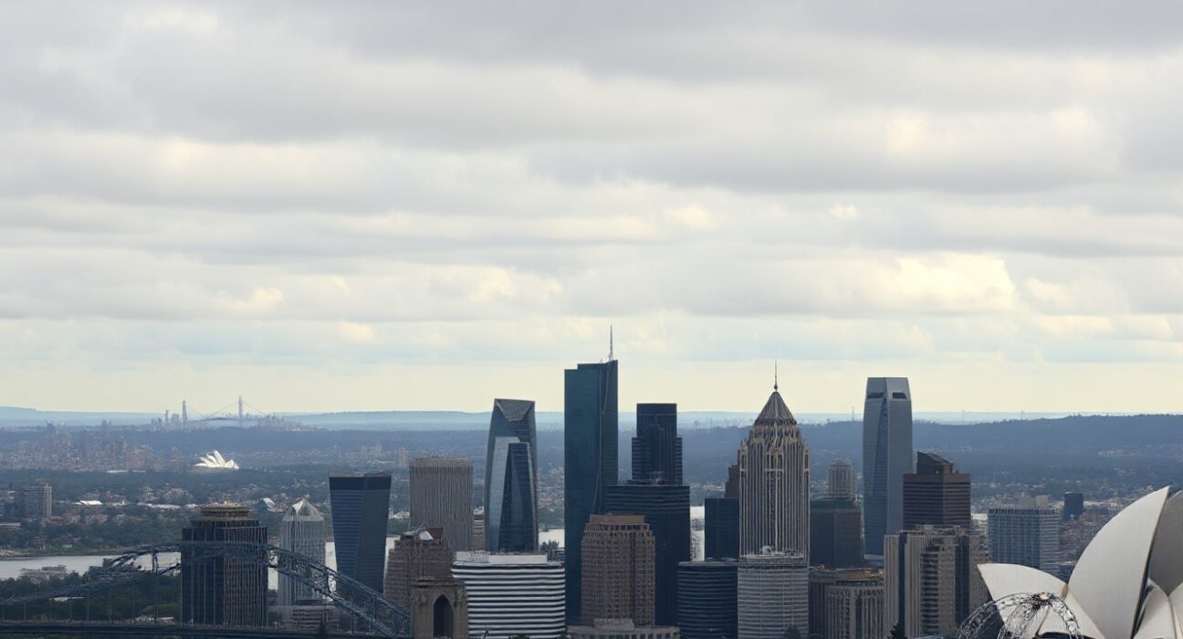 Sydney skyline on overcast day reflecting economic slowdown in Australia