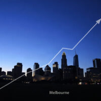 Melbourne skyline at dusk with an upward-trending graph line overlay symbolizing rising inflation in Australia.