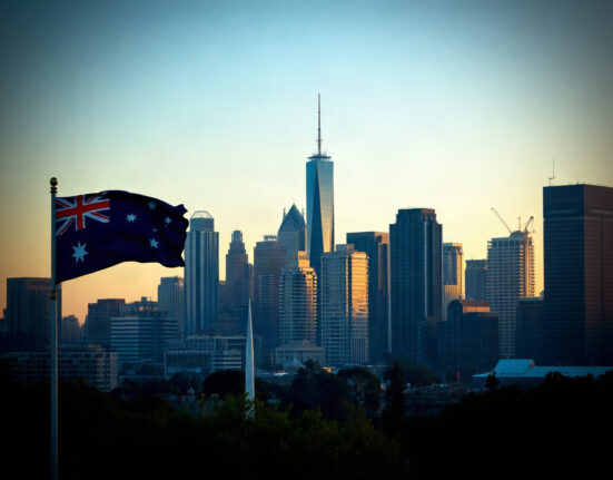 Melbourne skyline at dusk, representing Australia's economic activity and inflation trends