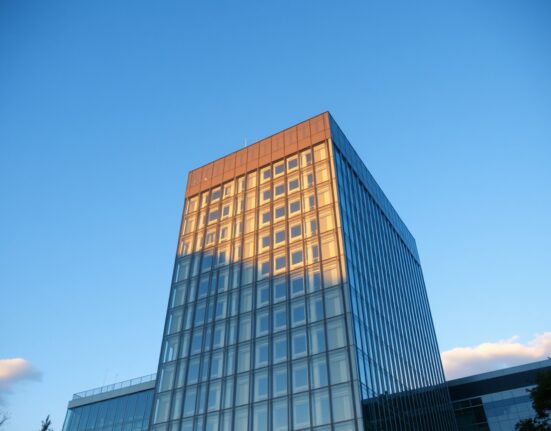 Reserve Bank of Australia headquarters in Sydney under a clear sky