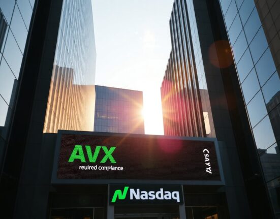 AvalancheOne stock ticker showing green upward trend on Nasdaq exchange building exterior