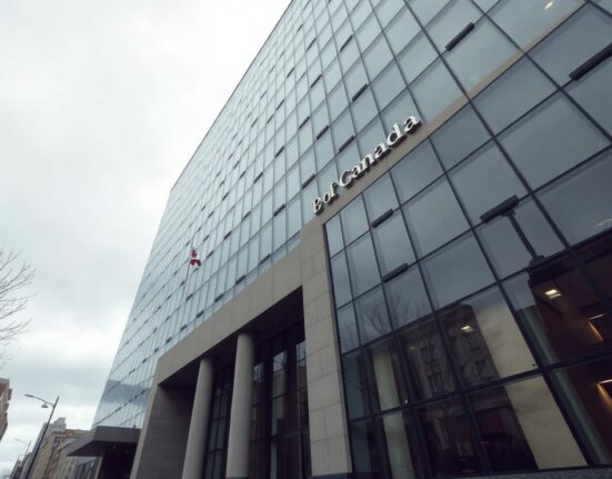 Bank of Canada headquarters in Ottawa under overcast sky, representing monetary policy decision