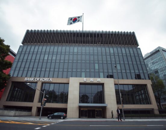 Exterior of the Bank of Korea headquarters in Seoul on a cloudy day.