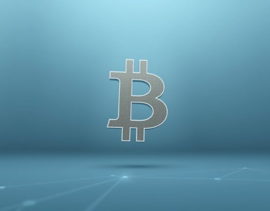 Bitcoin symbol fading to represent the significant decline in active network addresses in 2025.