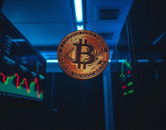 Bitcoin coin floating above trading screens with liquidation data
