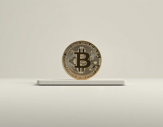 Bitcoin coin resting on stable surface representing sideways market consolidation period.