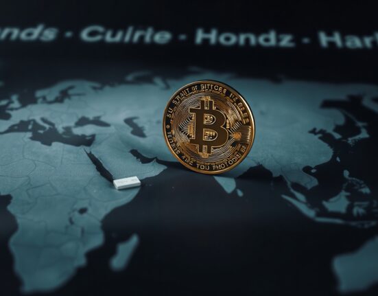 Bitcoin coin on a map with the Strait of Hormuz region highlighted, symbolizing geopolitical impact on BTC.