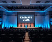 Empty stage at Moscone West with Disrupt 2026 logo on screen, awaiting speakers for Bitcoin World Disrupt 2026