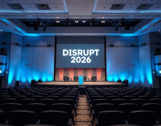 Empty stage at Moscone West with Disrupt 2026 logo on screen, awaiting speakers for Bitcoin World Disrupt 2026