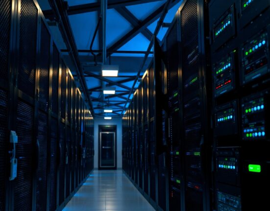 Data center server rack with blinking LEDs during scheduled maintenance