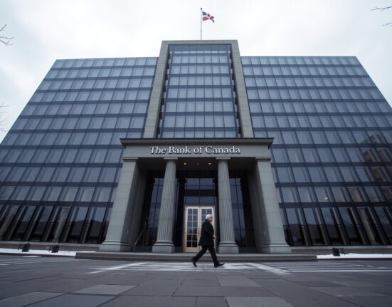 Bank of Canada headquarters in Ottawa on a cloudy day, reflecting institutional tone