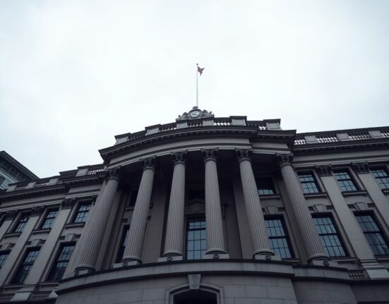Bank of England building in London under overcast sky, representing monetary policy and inflation analysis.
