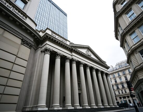 Bank of England building on Threadneedle Street, London, under overcast sky
