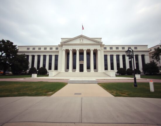 Exterior of the Federal Reserve Building in Washington, D.C., under overcast skies.