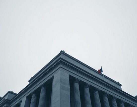 Bank of Japan headquarters building in Tokyo under overcast sky