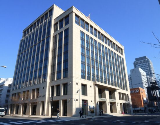 Bank of Japan headquarters building representing potential monetary policy shift affecting JPY currency markets.
