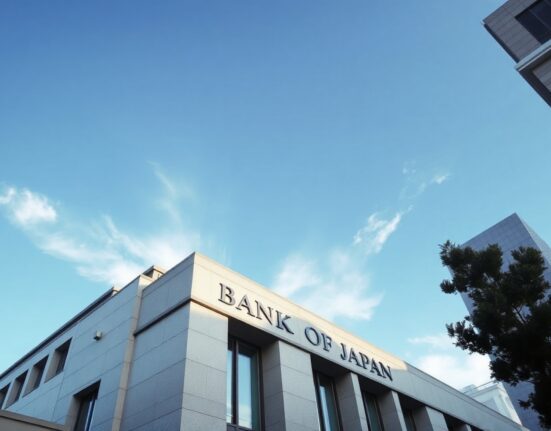 Bank of Japan headquarters in Tokyo under a clear blue sky