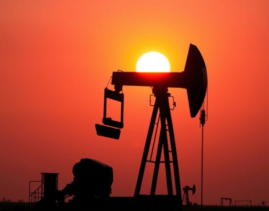Oil pumpjack silhouetted against a sunset sky representing Brent crude supply shock