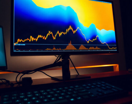 Trading monitor displaying BTC spot CVD and volume heatmap chart.