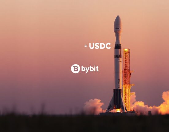 SpaceX rocket launch at dusk with digital USDC and Bybit overlay