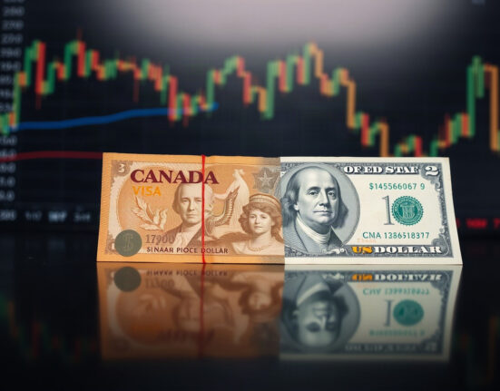 Canadian and US dollar banknotes on a reflective surface with a blurred financial chart in the background
