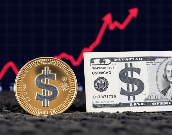 Canadian Dollar Faces Pressure: UBS Raises USD/CAD Forecast, Highlighting G10 Lag