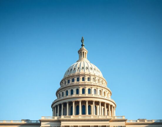 U.S. Capitol building under a clear blue sky, representing legislative action on crypto regulation.