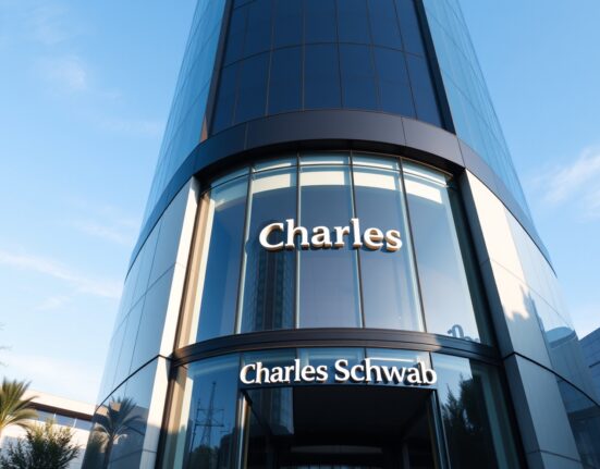 Exterior of a Charles Schwab office building under a clear blue sky