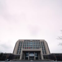 National Bureau of Statistics headquarters in Beijing, China, under overcast sky