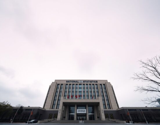 National Bureau of Statistics headquarters in Beijing, China, under overcast sky