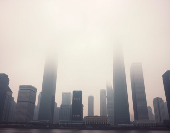 Shanghai skyline under overcast sky representing economic uncertainty from geopolitical risks
