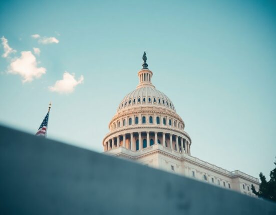 US Capitol building on a clear day, symbolizing legislative review of the CLARITY Act for digital asset regulation.