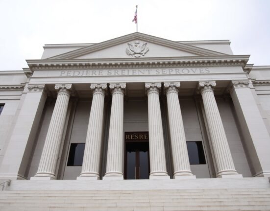 Exterior of the Federal Reserve building in Washington, D.C., under overcast sky
