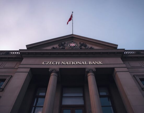 Czech National Bank headquarters in Prague, with the bank's sign visible, representing the central bank's rate decision.