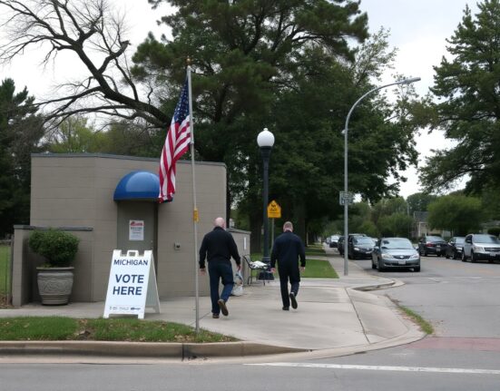 Voters enter a Michigan polling station on primary day, reflecting the Democratic primary outcome.