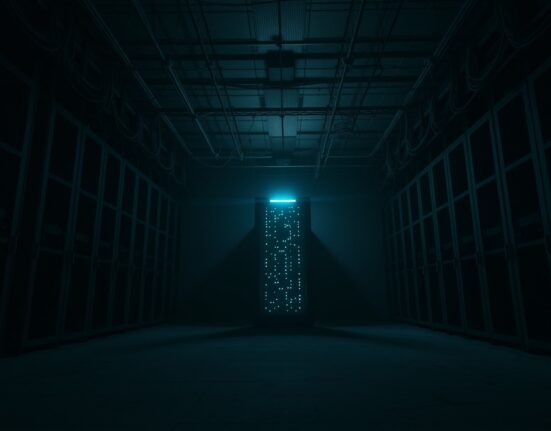 Empty dark server room with a single glowing server rack, symbolizing the shutdown of crypto projects.