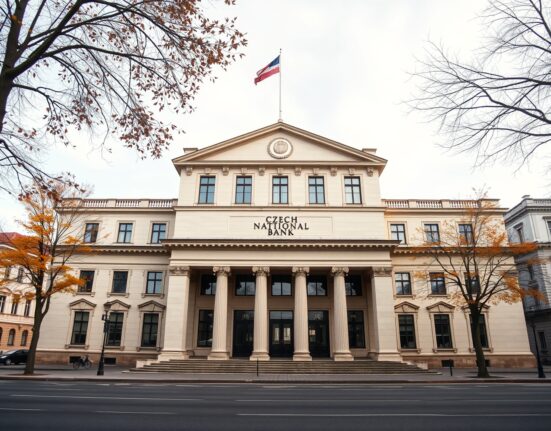 Exterior of the Czech National Bank building in Prague on a cloudy day.
