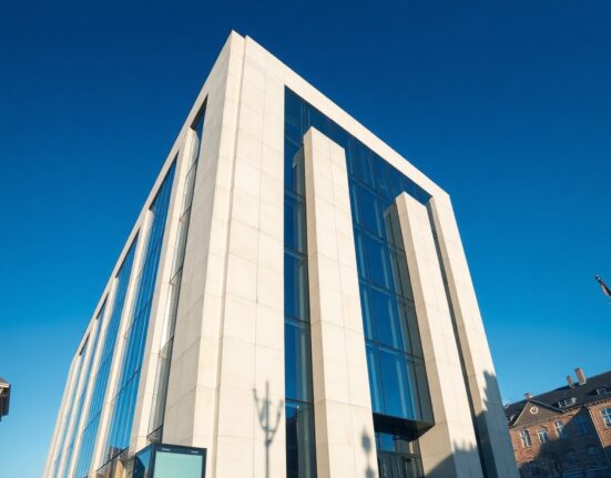Danmarks Nationalbank building in Copenhagen, Denmark, symbolizing the country's central bank and currency reserves.