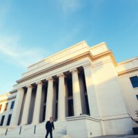 Exterior of the Federal Reserve building in Washington, D.C., on a sunny day