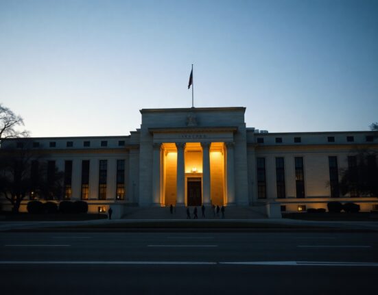 Federal Reserve building in Washington, D.C., at golden hour, symbolizing monetary policy decision anticipation.