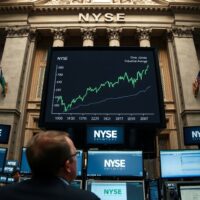 NYSE trading floor with green stock charts and Dow Jones index display