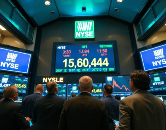 Traders on NYSE floor watching Dow Jones hit record high on screen