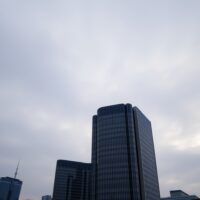 European Central Bank headquarters in Frankfurt under overcast sky, reflecting economic uncertainty