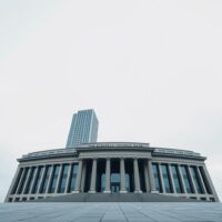European Central Bank headquarters in Frankfurt, Germany, under an overcast sky.