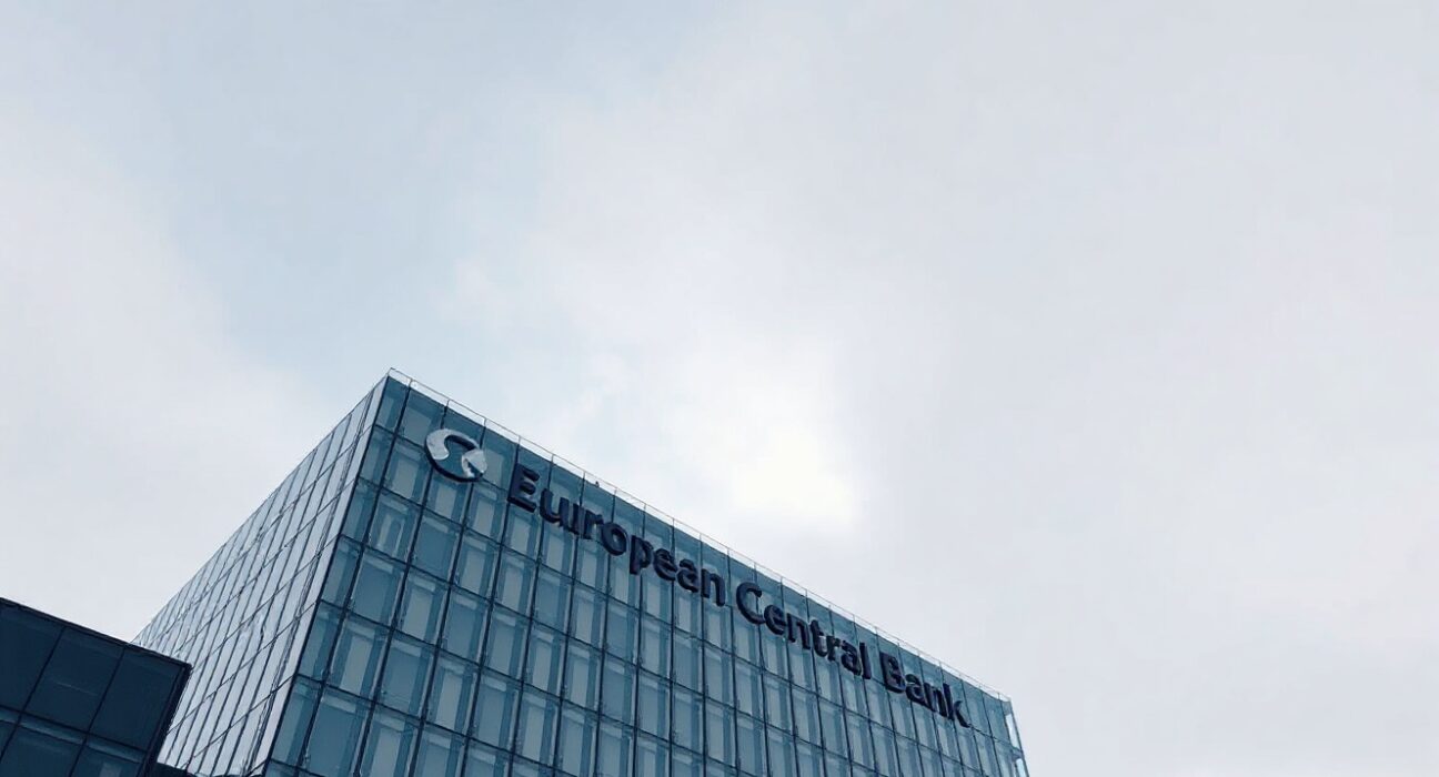 European Central Bank headquarters in Frankfurt under overcast sky, representing euro area monetary policy analysis.