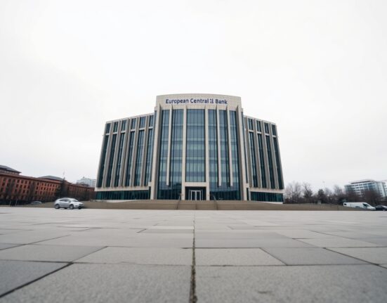 European Central Bank headquarters in Frankfurt under overcast sky, low-angle view