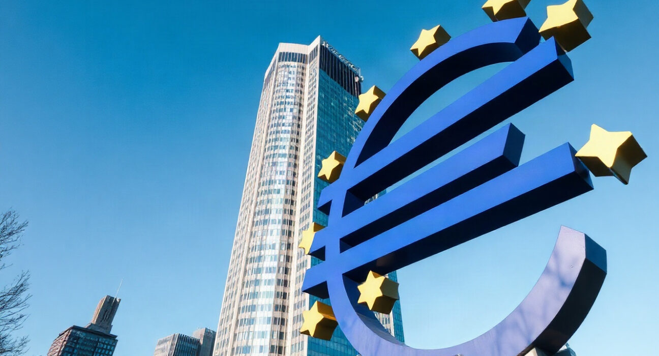 European Central Bank headquarters in Frankfurt, Germany, with the Euro sign sculpture in front.